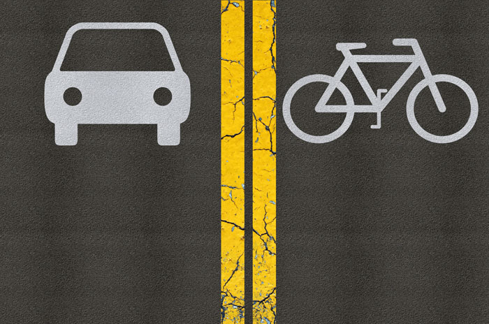road with a car icon and a bike icon | Tips for Sharing the Road