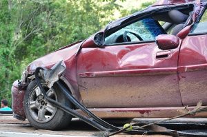 car damaged from accident | Who is Responsible for Paying Medical Bills After an Accident?